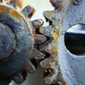 Rusty mechanical gear stack in a garage