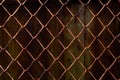 Rusty mesh background texture. Stock photo focus on a rusty sect of the fence Royalty Free Stock Photo