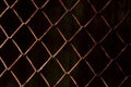 Rusty mesh background texture. Stock photo focus on a rusty sect of the fence Royalty Free Stock Photo