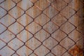 Rusty mesh background texture. Stock photo focus on a rusty sect of the fence Royalty Free Stock Photo