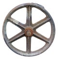 Rusty metal  aged wheel from an retro  agricultural  tractor  and machinery with lichen spots isolated Royalty Free Stock Photo