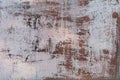 Rusty metal background close-up with old, peeling cracked paint, atmospheric impact, outdoors. Royalty Free Stock Photo