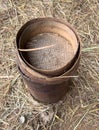 A rusty metal container with a mesh screen on top Royalty Free Stock Photo