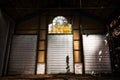 Rusty metal door in an abandoned warehouse