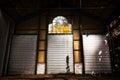 Rusty metal door in an abandoned warehouse Royalty Free Stock Photo