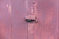 Padlock on an old metal door Royalty Free Stock Photo