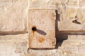 Rusty metal door of the electric box. Old abandoned electrical junction box on the wall of an old house Royalty Free Stock Photo