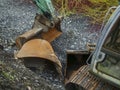 Rusty metal excavator bucket different size on a ground by excavator. Heavy machinery equipment