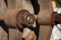 Rusty metal fittings showing bolts one focus out of focus