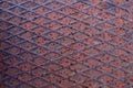 Rusty metal floor, covering. Diamond-shaped rusty metallic coating, Royalty Free Stock Photo