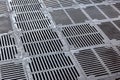 Rusty metal grille of sewer. grate of water drain. Royalty Free Stock Photo