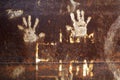 Rusty metal with handprint