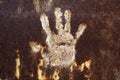 Rusty metal with handprint