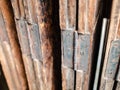 Rusty metal hinges in very old foldable wooden doors
