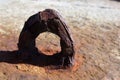 Rusty metal loop on a sea beach Ireland