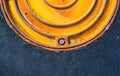 Rusty metal manhole cover Royalty Free Stock Photo