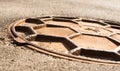 Rusty metal manhole cover Royalty Free Stock Photo