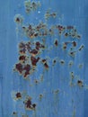 Rusty metal panel with cracked blue paint, corroded grunge metal background Royalty Free Stock Photo