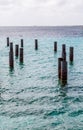Rusty Metal Pilings in Harbor Royalty Free Stock Photo
