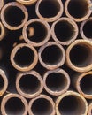 Rusty metal pipes from the butt, texture background Royalty Free Stock Photo