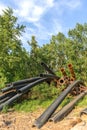 Rusty metal pipes in the forest Royalty Free Stock Photo