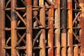 Rusty metal pipes of old bridge construction Royalty Free Stock Photo