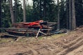 Rusty metal pipes in the pine forest Royalty Free Stock Photo