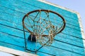 Rusty metal ring with basketball net and wooden shield Royalty Free Stock Photo