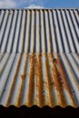 Rusty metal rooftop under the blue sky Royalty Free Stock Photo