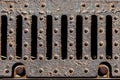 Rusty metal sewer grate close-up Royalty Free Stock Photo