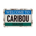 Welcome to Caribou Maine vintage rusty metal sign on a white background, vector illustration Royalty Free Stock Photo