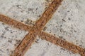 Rusty metal structure in a concrete slab