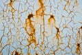 Rusty metal texture background with cracked white-blue paint Royalty Free Stock Photo