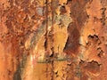 Rusty metal texture background. Metal surface with remnants of old paint and severe corrosion
