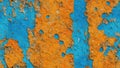 Rusty metal texture. Red yellow orange blue abstract background. Cracked peeling paint. Old painted iron surface. Royalty Free Stock Photo