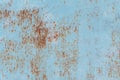 Rusty metal texture with scratches and cracks. paint traces. Blue and dirty orange colors. Copy space