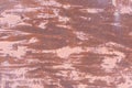 Rusty metal texture with scratches and cracks. paint traces. Red and pinkcolors. Copy space Royalty Free Stock Photo