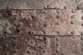 Rusty metal texture. Studded iron plate. Rivets on old rusty met Royalty Free Stock Photo