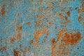 Rusty metal turquoise and red color texture background. Oxidated metal surface. Old vintage painted steel plate