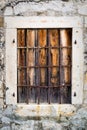 Rusty metal window with bars Royalty Free Stock Photo