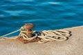 Rusty Mooring Bollard with Ropes in the Port - La Spezia Italy Royalty Free Stock Photo