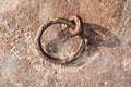 Rusty mooring ring on quay Royalty Free Stock Photo