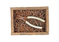 Rusty nail and wire cutter in wooden box Royalty Free Stock Photo