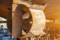 Rusty in the nozzle, the rudder and shaft of the ship, standing in a dry dock during the repair