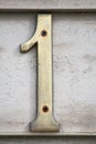 Rusty Number one off a house Royalty Free Stock Photo