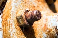 Rusty nut is on bolt with corrosion Royalty Free Stock Photo