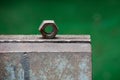 Rusty nut on a metal vise, soft focus Royalty Free Stock Photo