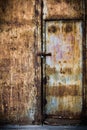 Rusty old brown metal door Royalty Free Stock Photo