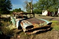 A rusty old car wreck slowly disintegrating Royalty Free Stock Photo