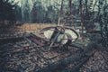 Rusty old children`s machine in an abandoned amusement park in carting, the ghost town of Pripyat, Chernobyl, the consequences of